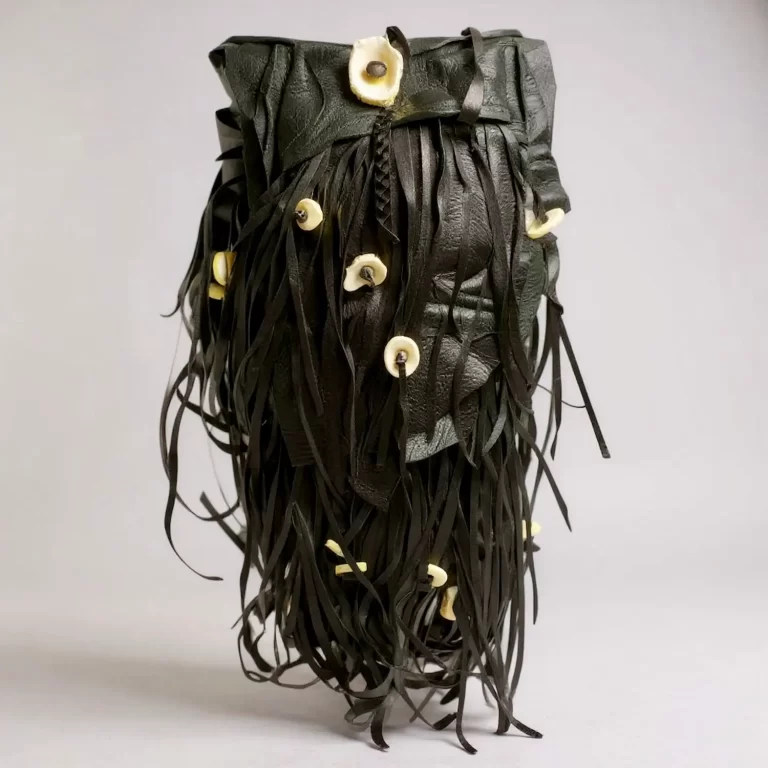 bespoke natural edge fringe pouch antler buttons