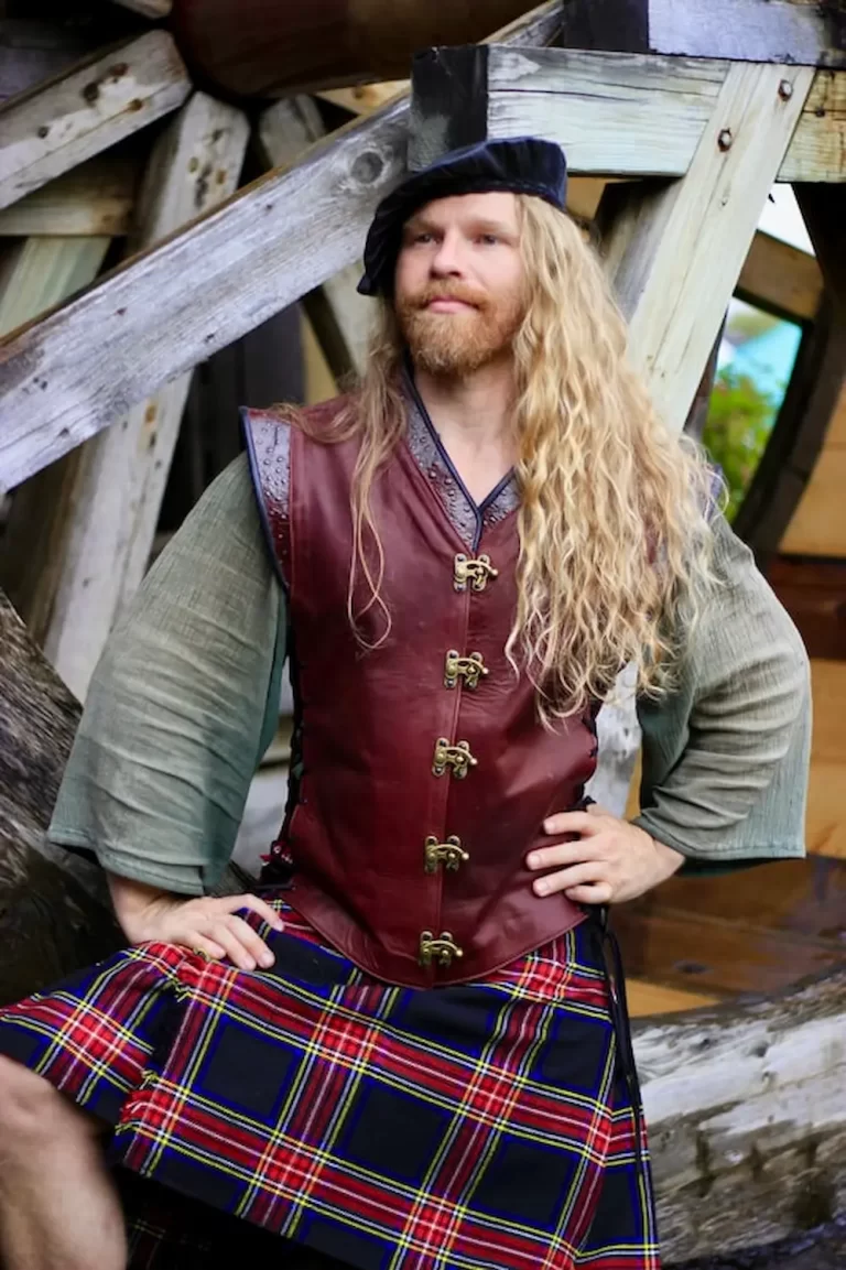 handcrafted leather jerkin crimson red ostrich brown brass buckles renaissance design kilt
