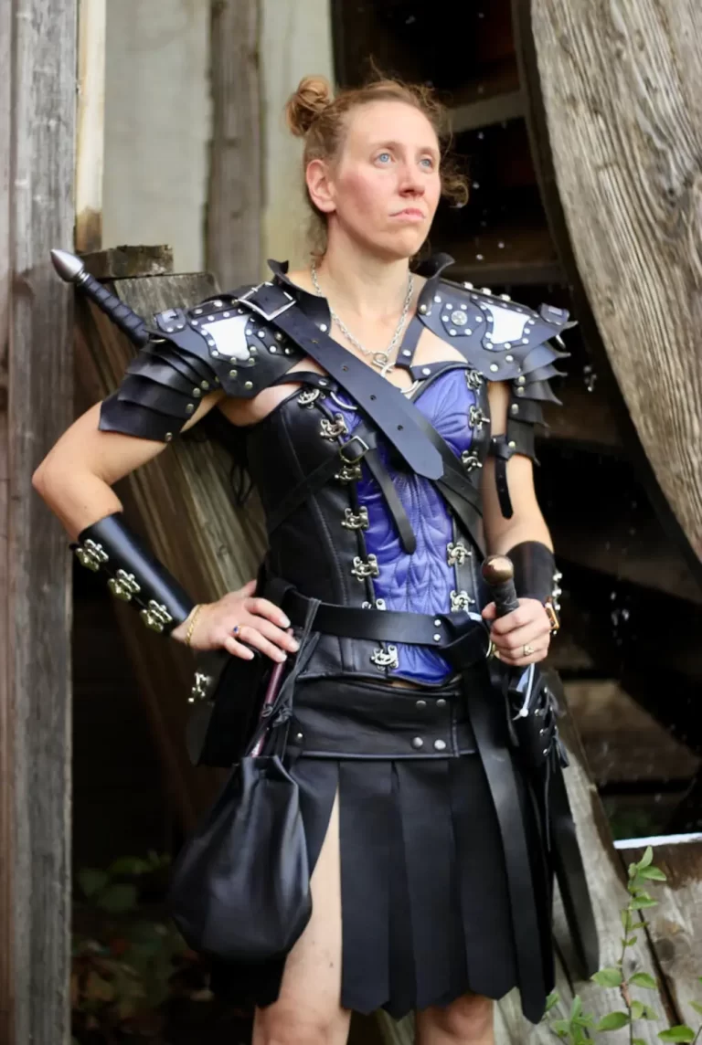 handmade leather sweetheart corset black quilted purple stitched hand design silver buckles renaissance shoulder pauldron armor bracers sword cosplay outfit